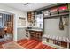 Well-organized mudroom featuring built-in shelves, a comfortable bench, and stylish decor for added convenience at 912 S Washington St, Denver, CO 80209
