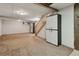 Basement features stairs to upper level and additional storage at 8867 Yukon St # 49, Broomfield, CO 80021