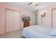 Comfortable bedroom with closet, ceiling fan, and neutral carpet creating a relaxing space at 8867 Yukon St # 49, Broomfield, CO 80021