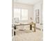 Bright home office with a large desk, modern decor, and ample natural light at 5397 Lenox Ct, Castle Rock, CO 80104