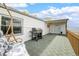 Back deck with gas grill and swing at 17445 County Road 6, Brighton, CO 80603