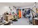 Basement workshop area with workbench, storage cabinets, and various tools and equipment at 17445 County Road 6, Brighton, CO 80603