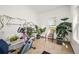 Bright bonus room with exercise equipment, large windows and tile flooring at 17445 County Road 6, Brighton, CO 80603