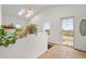 Bright entryway with skylights, tiled floor, and view to the outside at 17445 County Road 6, Brighton, CO 80603
