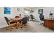 Bright office featuring an oval table and three chairs for a home office and dining space at 17445 County Road 6, Brighton, CO 80603