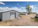 Aerial view of outbuildings, including a garage and large metal building at 17445 County Road 6, Brighton, CO 80603