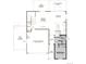 First floor plan featuring an open kitchen, great room, dining area, bedroom, and two car garage at 4455 Boone Cir, Brighton, CO 80601