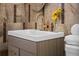 Close up of bathroom sink with modern vanity and tile backsplash at 3351 S Field St # 104, Lakewood, CO 80227
