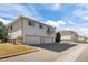 Spacious two-story apartment complex with individual garages, set in a well-maintained community at 3351 S Field St # 104, Lakewood, CO 80227