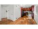 Bright kitchen with hardwood floors, modern appliances, and ample cabinet space at 3351 S Field St # 104, Lakewood, CO 80227