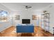 Inviting living room featuring hardwood floors, recessed lighting, and a comfortable seating area at 3351 S Field St # 104, Lakewood, CO 80227