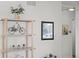 Charming living room display shelf with tasteful decorative accents at 3351 S Field St # 104, Lakewood, CO 80227