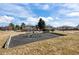 Community playground featuring play structures and plenty of space for children to enjoy outdoor activities at 3351 S Field St # 104, Lakewood, CO 80227