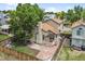 Aerial view of the backyard, stone patio, and neighborhood at 9669 Jellison Way, Broomfield, CO 80021