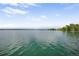 Scenic lake view showcasing the calming water and open skyline at 9669 Jellison Way, Broomfield, CO 80021
