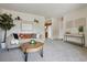 Comfortable living room showcasing stylish decor, a plush sofa, and plenty of space at 8625 W Dartmouth Pl, Lakewood, CO 80227