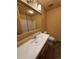 Bright bathroom featuring a sink, toilet and shower/tub combo at 440 Empire St, Aurora, CO 80010