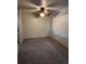 Simple dining room with ceiling fan and neutral carpeting at 440 Empire St, Aurora, CO 80010