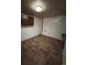 Basement laundry room with tile floor and cabinets at 440 Empire St, Aurora, CO 80010