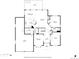 Main floor featuring kitchen, dining room, living room, and garage at 14261 W Evans Cir, Lakewood, CO 80228