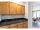 Pantry with ample cabinet space and granite countertops at 14261 W Evans Cir, Lakewood, CO 80228