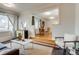 Cozy living room with dining area, hardwood floors, ample natural light, and stylish decor at 2281 Florence St, Aurora, CO 80010