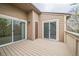Outdoor balcony features wooden deck at 10303 E Peakview Ave # G203, Englewood, CO 80111