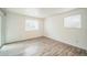 Bright bedroom with hardwood floors and natural light at 10303 E Peakview Ave # G203, Englewood, CO 80111