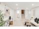 Finished basement with neutral carpet, large windows and access to a bathroom and stairs at 3361 W 36Th Ave, Denver, CO 80211