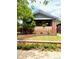 Charming brick home with manicured lawn and inviting front porch, perfect for relaxing at 3361 W 36Th Ave, Denver, CO 80211