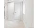 Bright hallway with white walls and access to multiple rooms at 3361 W 36Th Ave, Denver, CO 80211