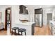 The modern kitchen features stainless steel appliances, stylish bar seating, and great storage at 3361 W 36Th Ave, Denver, CO 80211