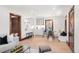 Open-concept living area connects the dining space and kitchen, with bright natural light at 3361 W 36Th Ave, Denver, CO 80211