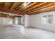 Unfinished basement with natural light, providing ample space for storage or future renovation at 6760 E 129Th Ave, Thornton, CO 80602