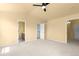 Bright bedroom featuring neutral carpet and en suite bathroom and closet at 6760 E 129Th Ave, Thornton, CO 80602
