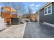 Large backyard patio with hot tub, fire pit, and outdoor space, ready for summer enjoyment at 5140 Mt Pawnee Ave, Frederick, CO 80504