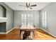 Well-lit dining room with hardwood floors at 5140 Mt Pawnee Ave, Frederick, CO 80504