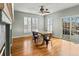 Dining room featuring hardwood floors and ample natural light at 5140 Mt Pawnee Ave, Frederick, CO 80504