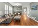 Comfortable living room with large windows and fireplace at 5140 Mt Pawnee Ave, Frederick, CO 80504