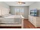 Bedroom with hardwood floors and soft, natural lighting at 5140 Mt Pawnee Ave, Frederick, CO 80504