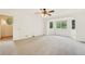 Large bedroom featuring neutral carpet, ceiling fan and a bright bay window at 465 Indian Way, Monument, CO 80132