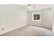 Bedroom with a large window and neutral carpet at 465 Indian Way, Monument, CO 80132