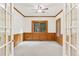 Spacious office with natural light, custom wood trim, and neutral carpet offers a professional, comfortable work environment at 465 Indian Way, Monument, CO 80132