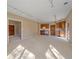 Spacious living room featuring carpeted floors, track lighting, and a convenient kitchenette at 4228 Scenic Village Dr, Evergreen, CO 80439