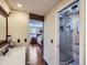 Stylish bathroom featuring a marble vanity and a glass-enclosed shower at 7872 S Hill Dr, Littleton, CO 80120