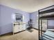 A well-lit bedroom features a bunk bed, a desk and a large dresser with a mirror creating a comfortable and functional space at 7872 S Hill Dr, Littleton, CO 80120