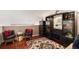 A stylish living room featuring a distinctive display cabinet and decorative furnishings at 4301 S Pierce St # 4D, Littleton, CO 80123