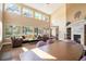 Cozy living room with ample natural light, a brick fireplace and comfortable seating arrangements at 4301 S Pierce St # 4D, Littleton, CO 80123
