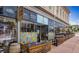 Charming restaurant exterior with outdoor seating and vibrant window art at 1441 Central St # 203, Denver, CO 80211