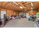 A large barn area with wood ceilings, storage, and workspace at 29145 E 160Th Ct, Brighton, CO 80603